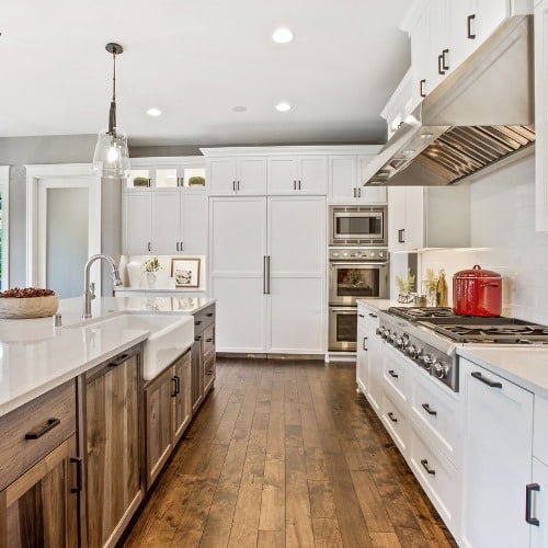 view of kitchen galley with hardwood flooring picture id1263782171 1